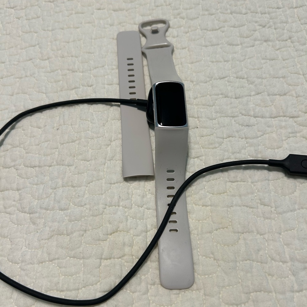 Smart Fitness Tracker with Silver Accents